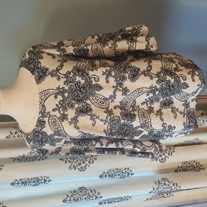 Blouse with scalloped edging